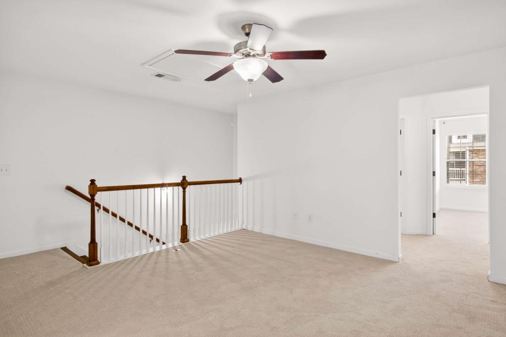 7631 Bucknell Terrace Fairburn, GA 30213 - Photo 19 of 43 a view of an empty room with a window