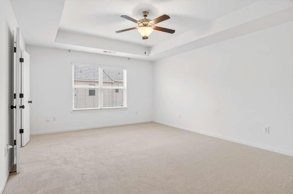 7631 Bucknell Terrace Fairburn, GA 30213 - Photo 21 of 43 a view of an empty room with a window