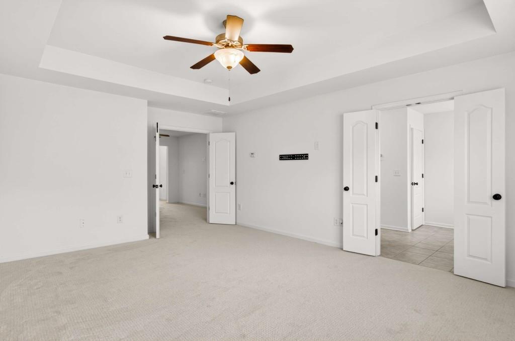 7631 Bucknell Terrace Fairburn, GA 30213 - Photo 22 of 43 wooden floor in an empty room