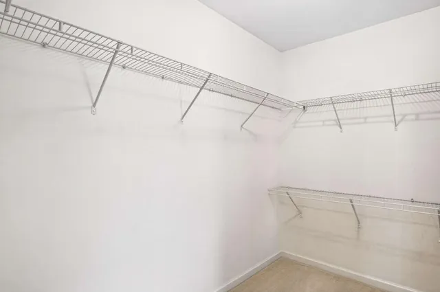 a view of a room with racks on the wall