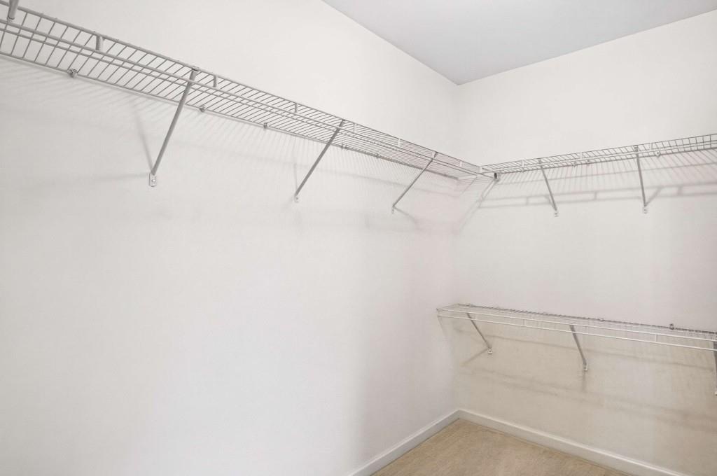 7631 Bucknell Terrace Fairburn, GA 30213 - Photo 26 of 43 a view of a room with racks on the wall