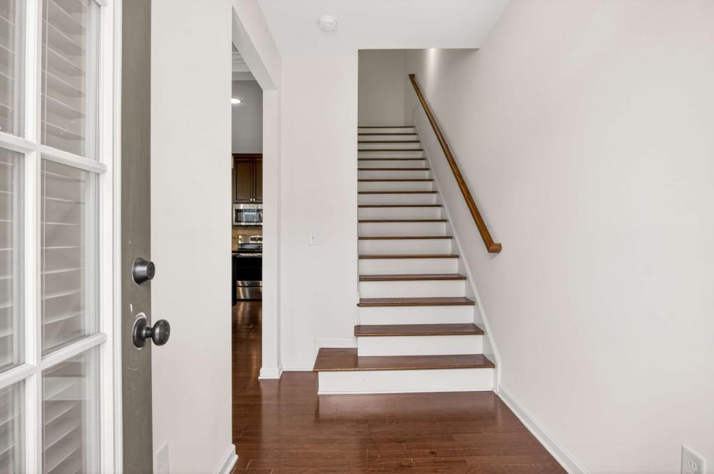 7631 Bucknell Terrace Fairburn, GA 30213 - Photo 3 of 43 a view of entryway with wooden floor