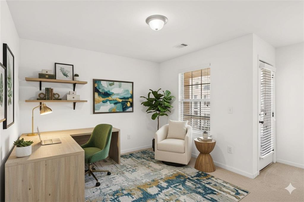 7631 Bucknell Terrace Fairburn, GA 30213 - Photo 32 of 43 a living room with furniture and a window