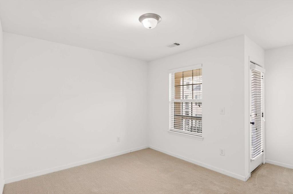 7631 Bucknell Terrace Fairburn, GA 30213 - Photo 34 of 43 an empty room with windows