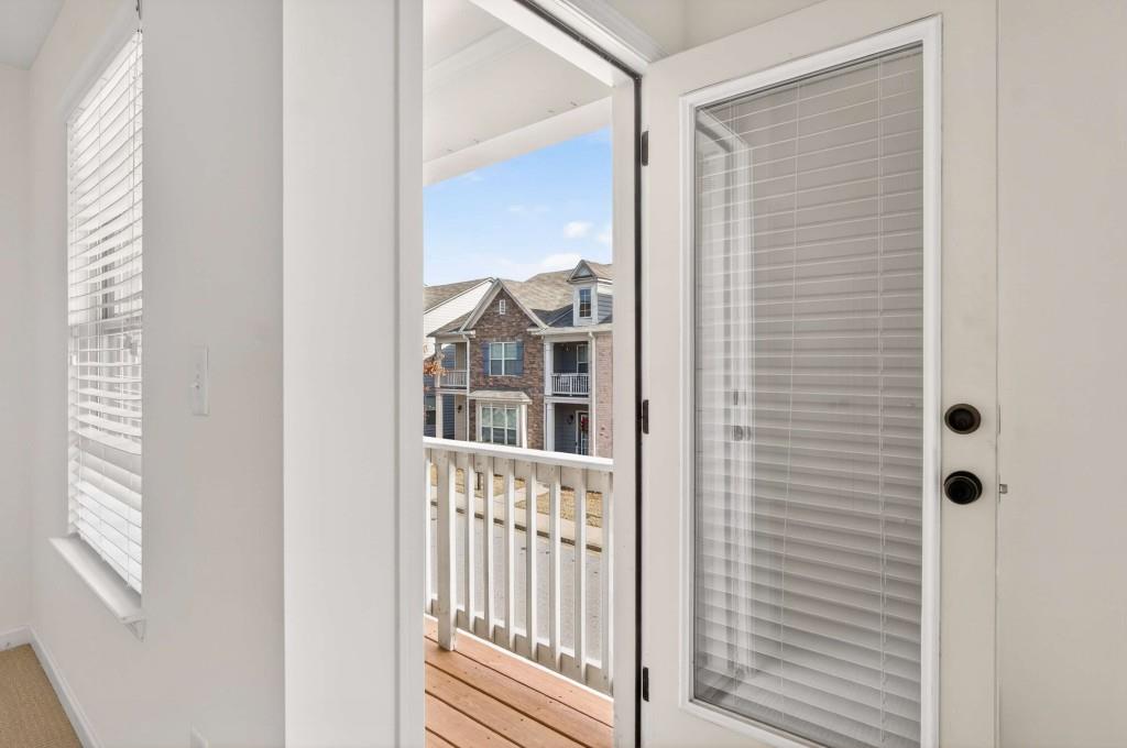 7631 Bucknell Terrace Fairburn, GA 30213 - Photo 36 of 43 a view of front door and bedroom