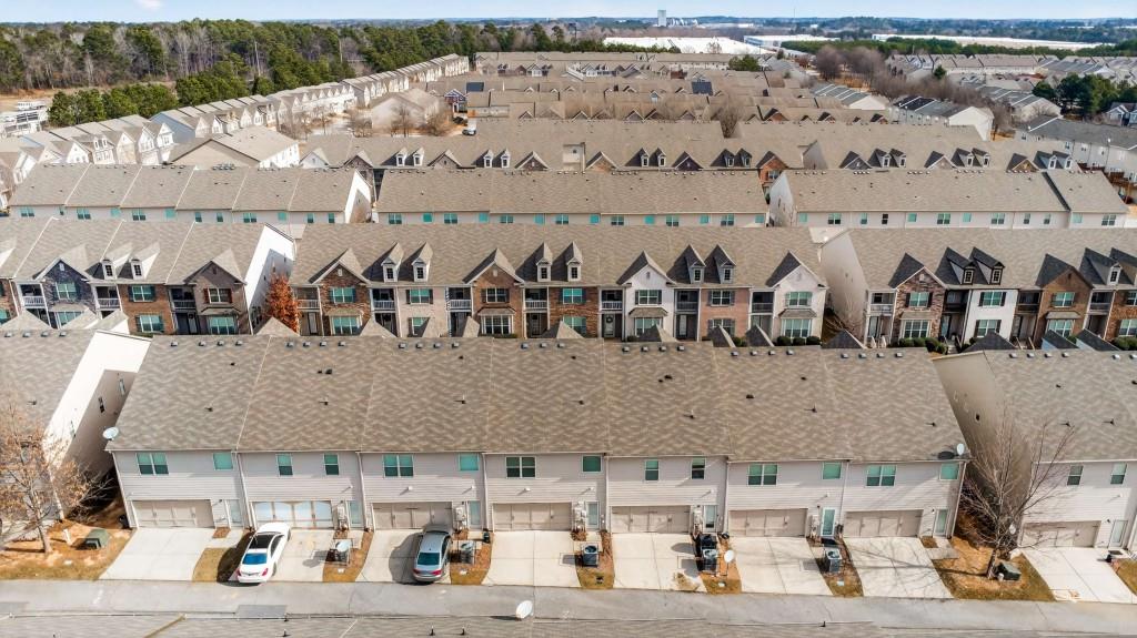 7631 Bucknell Terrace Fairburn, GA 30213 - Photo 38 of 43 a view of building with outdoor space