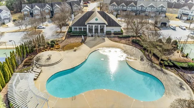 a picture of a bathroom with a sink and mirror