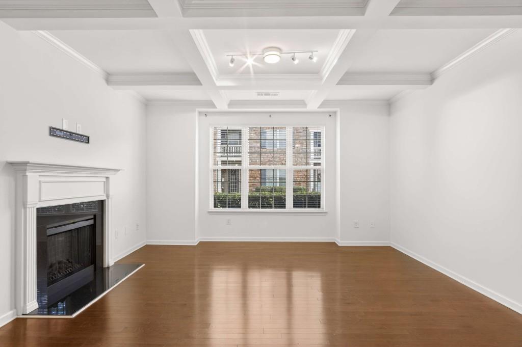 7631 Bucknell Terrace Fairburn, GA 30213 - Photo 5 of 43 a view of an empty room with a fireplace