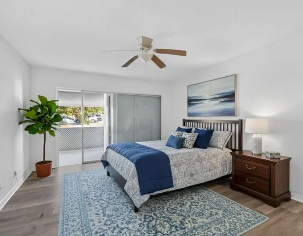 a front view of a building with a yard