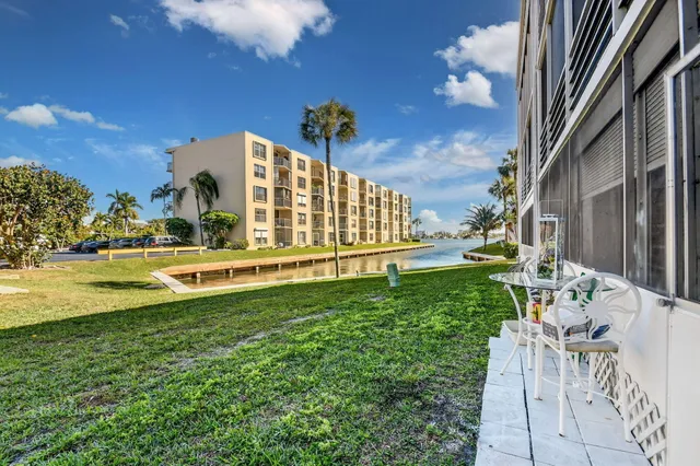 a view of a balcony with outdoor seating