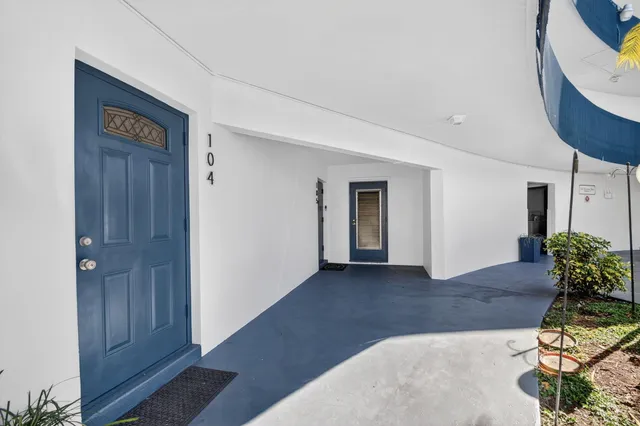 a view of walk in closet with clothes