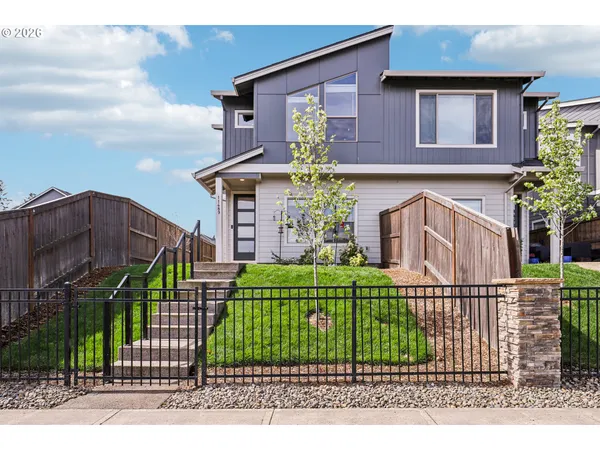 front view of a house with a small yard