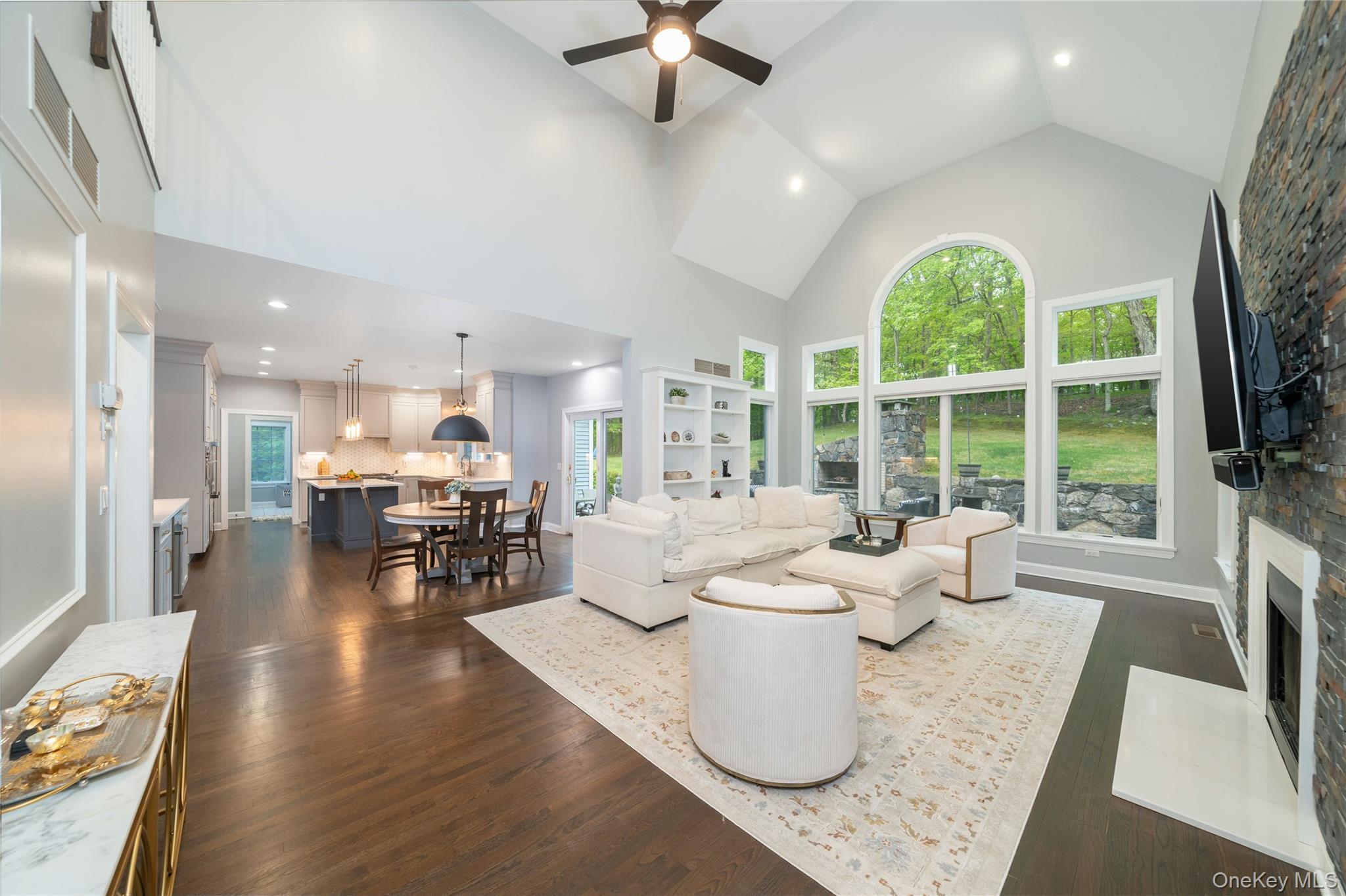 630 Chappaqua Road Briarcliff Manor, NY 10510 - Photo 5 of 41 Stunning open-concept layout connecting the chef’s kitchen, dining area, and dramatic family room with soaring ceilings