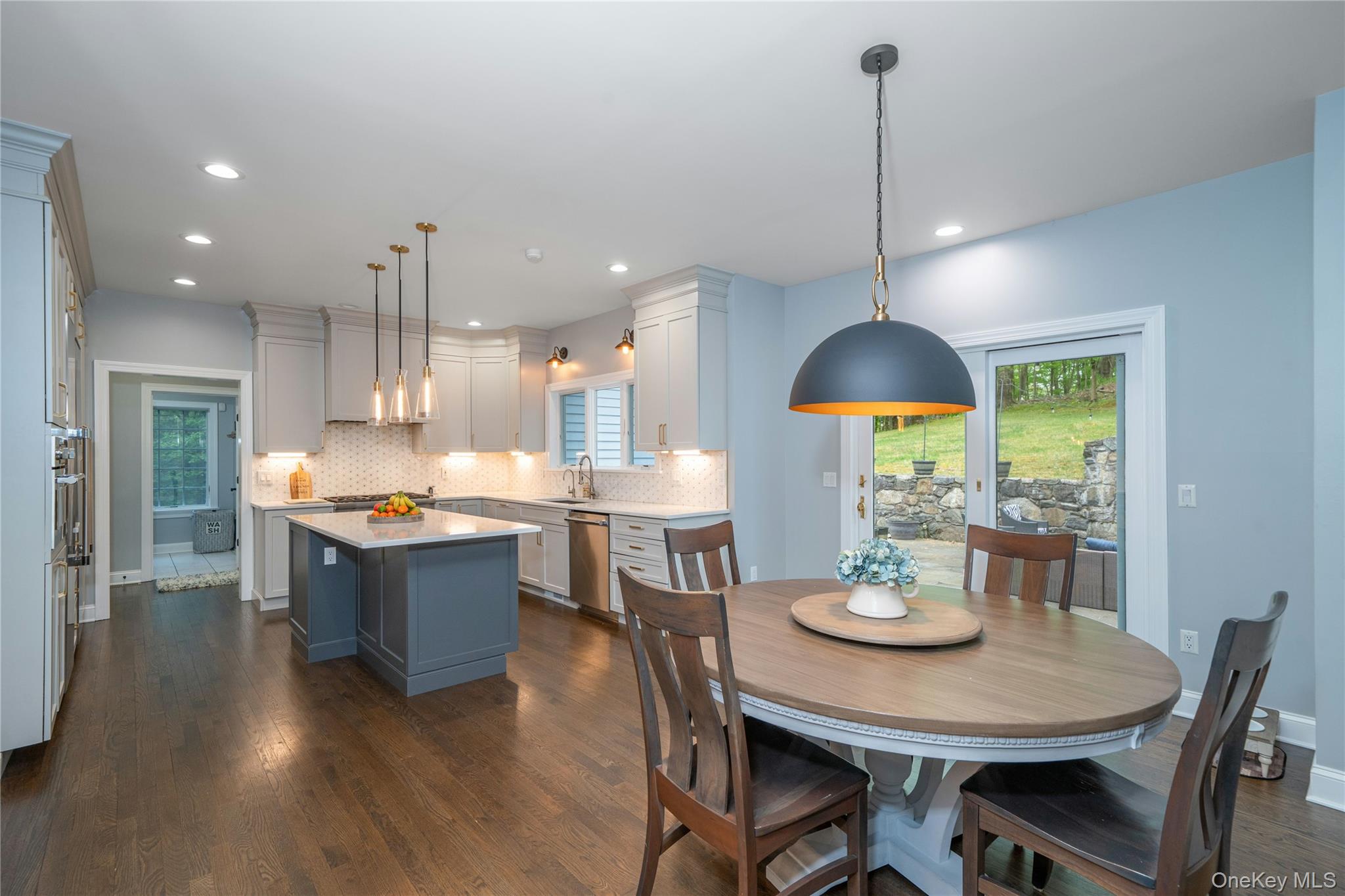630 Chappaqua Road Briarcliff Manor, NY 10510 - Photo 6 of 41 Beautifully renovated chef’s kitchen with custom cabinetry, quartz countertops, and spacious dining area