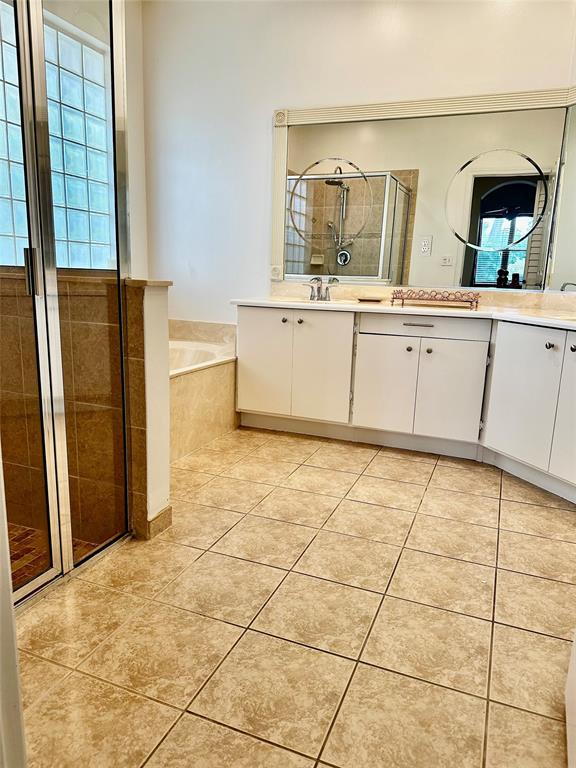 8564 Vía Giardino Boca Raton, FL 33433 - Photo 14 of 20 a kitchen with a sink a stove and cabinets