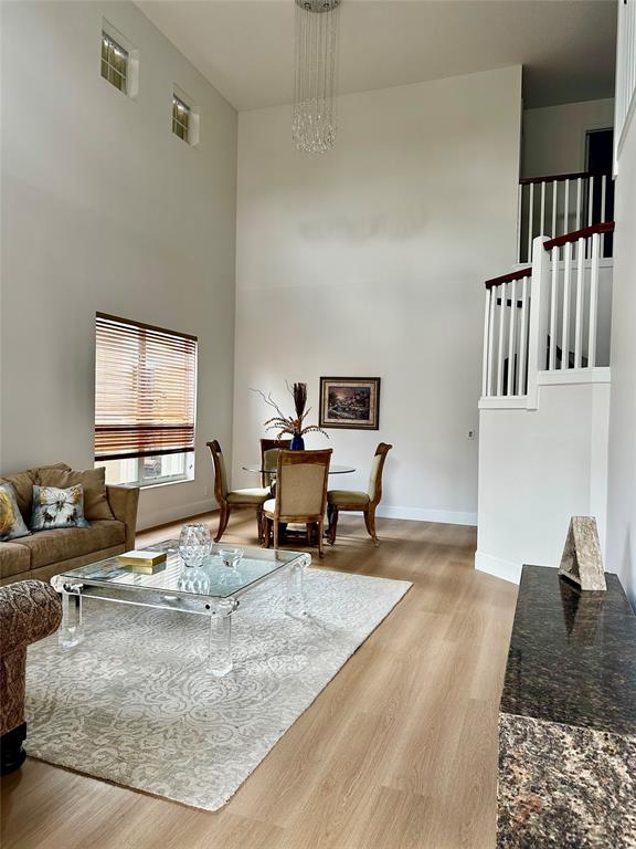 8564 Vía Giardino Boca Raton, FL 33433 - Photo 2 of 20 a living room with furniture rug and a window