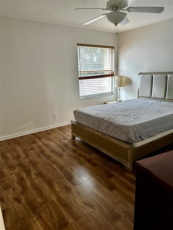 8564 Vía Giardino Boca Raton, FL 33433 - Photo 6 of 20 a bedroom with a bed and window