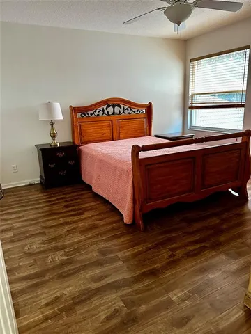 a bathroom with a toilet a sink and shower