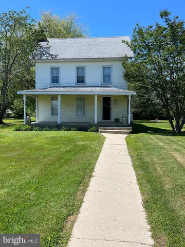 a front view of house with yard