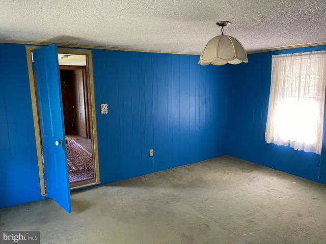 a view of a door and a window