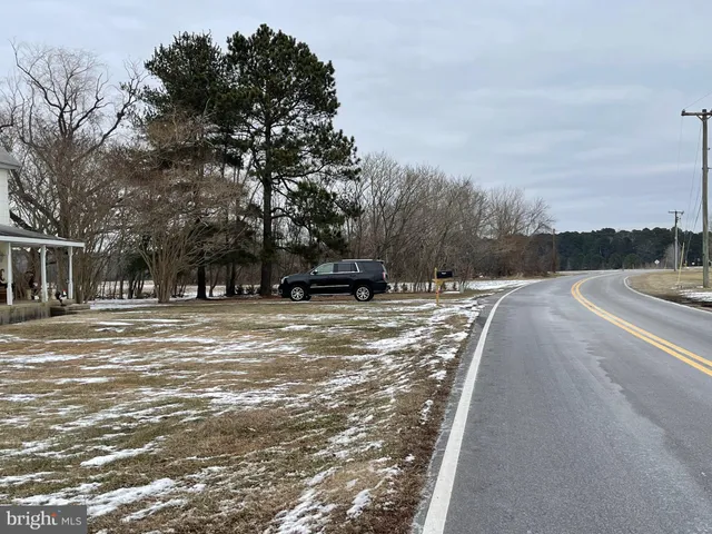 a view of street with residential house