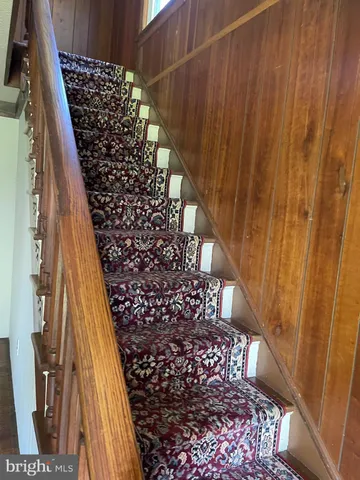 a kitchen with a stove a sink and a refrigerator