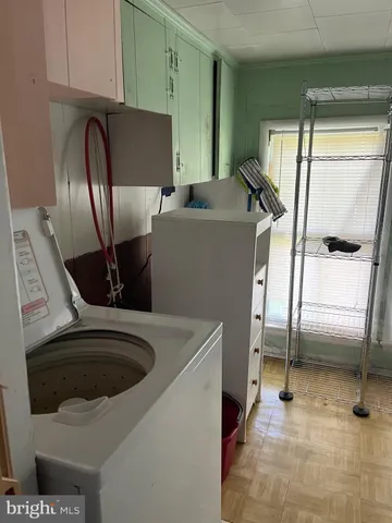 a bathroom with a sink a toilet and a shower