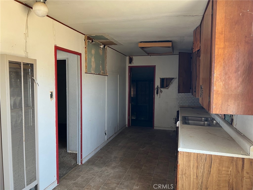 27154 Anderson Street Boron, CA 93516 - Photo 4 of 12 a view of a storage & utility room