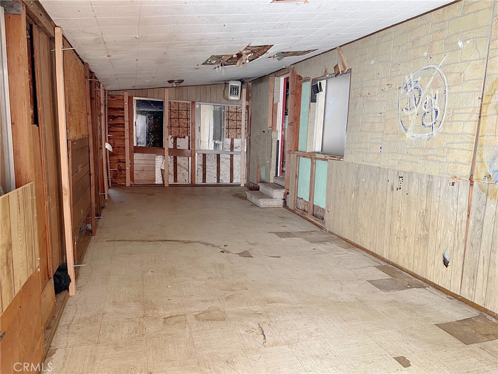 27154 Anderson Street Boron, CA 93516 - Photo 10 of 12 a view of entryway with wooden walls