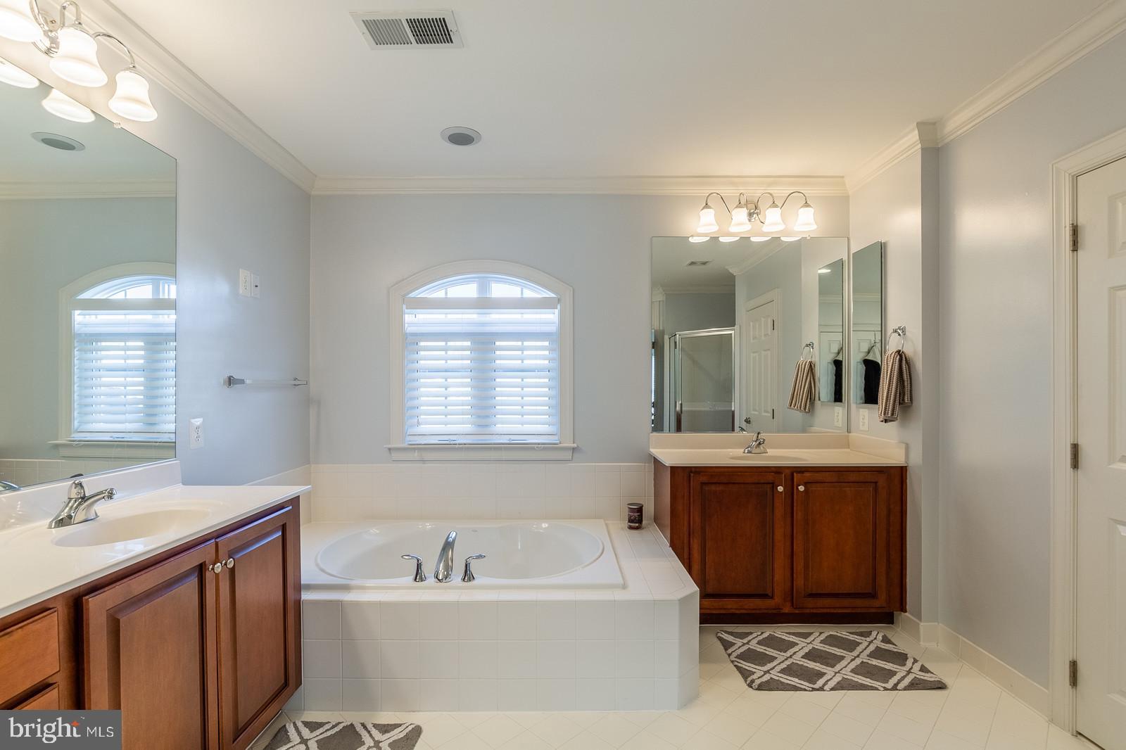 18487 Kerill Road Triangle, VA 22172 - Photo 22 of 45 Master bath w/ separate vanities and soaking tub
