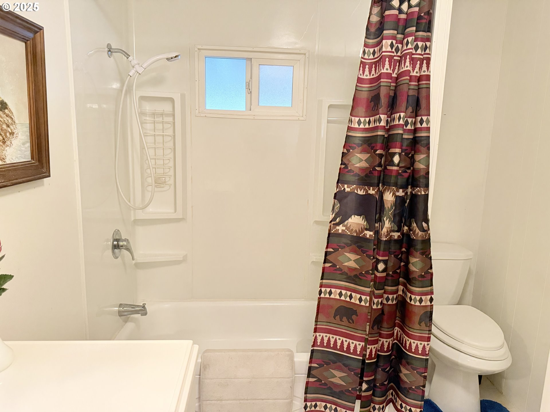 1475 Green Acres Road, Unit 40 Eugene, OR 97408 - Photo 19 of 30 walk in closet with wooden floor