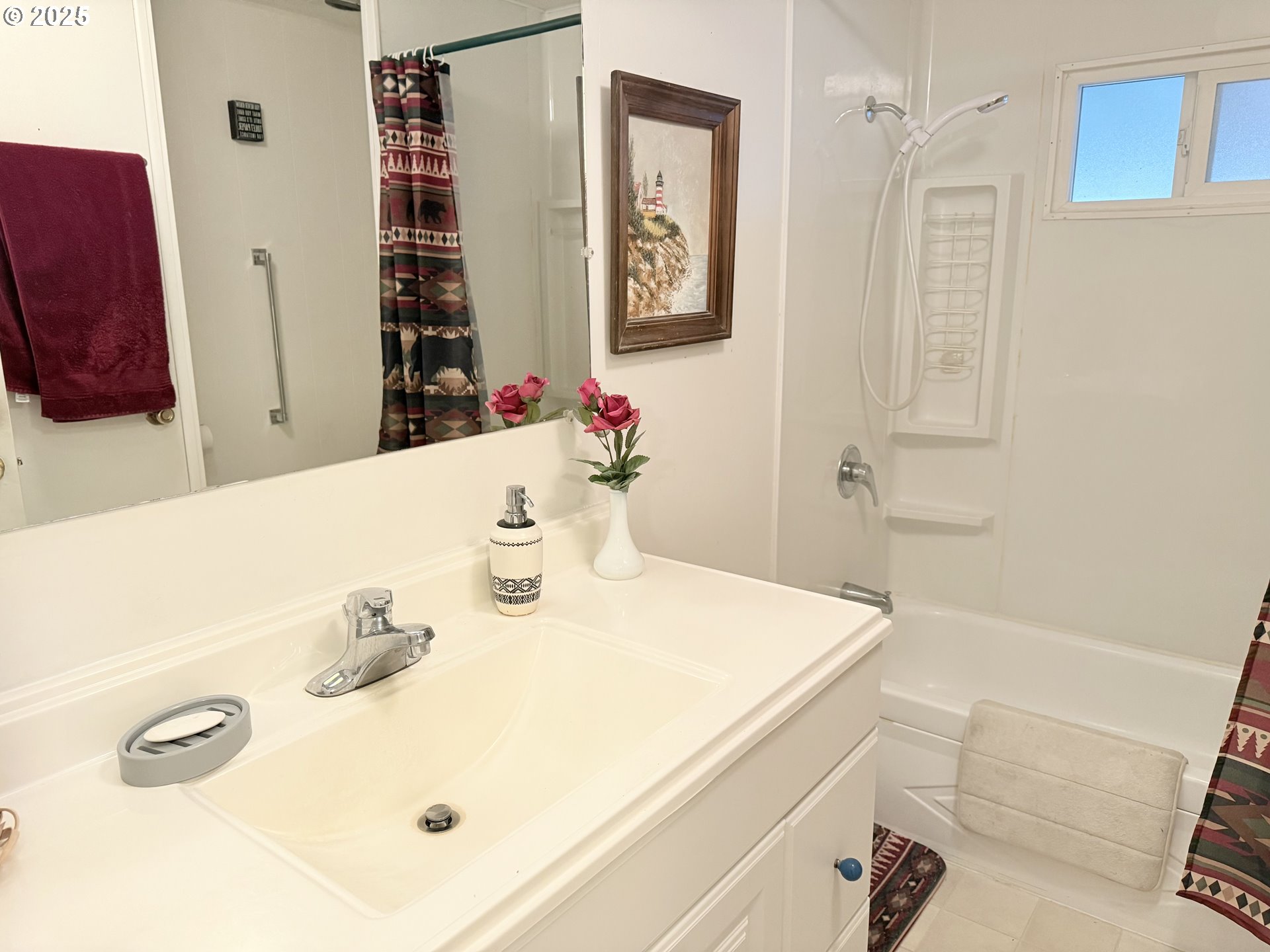 1475 Green Acres Road, Unit 40 Eugene, OR 97408 - Photo 20 of 30 a bathroom with a sink and a mirror
