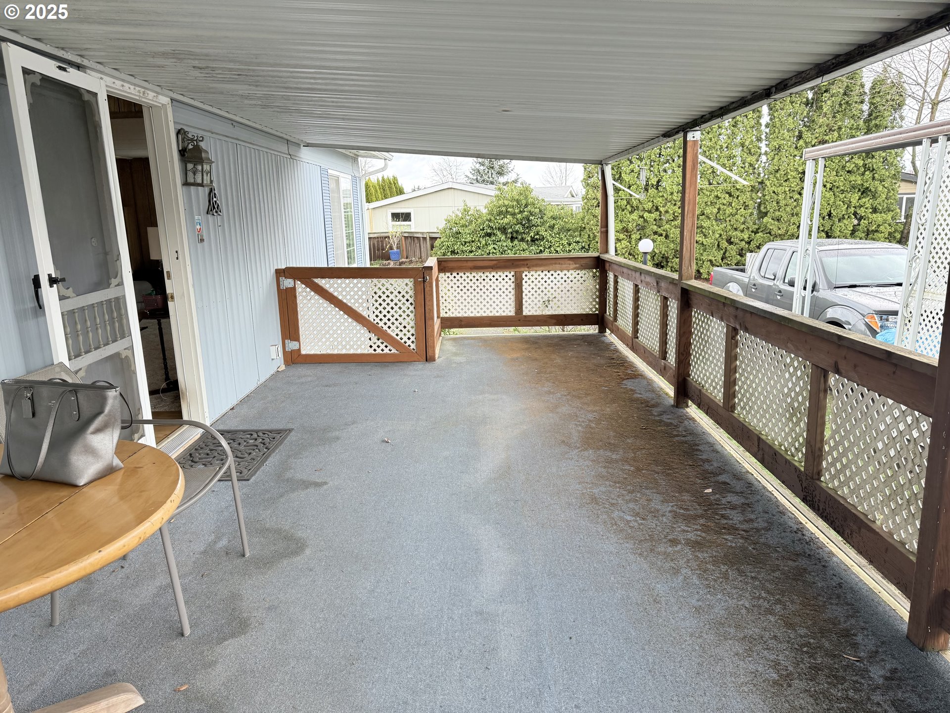 1475 Green Acres Road, Unit 40 Eugene, OR 97408 - Photo 22 of 30 a view of a room with wooden floor and furniture