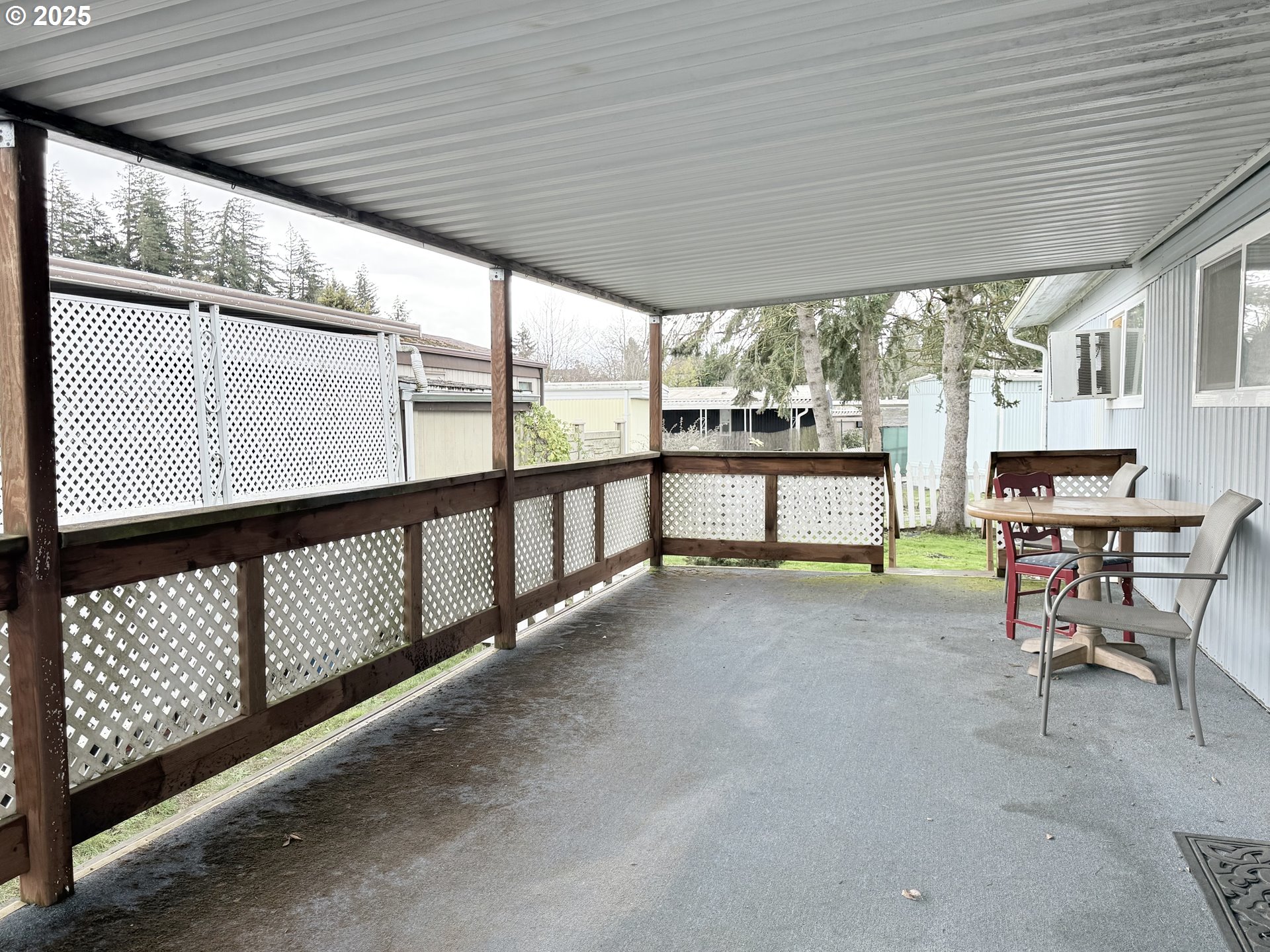 1475 Green Acres Road, Unit 40 Eugene, OR 97408 - Photo 23 of 30 a view of a porch with furniture