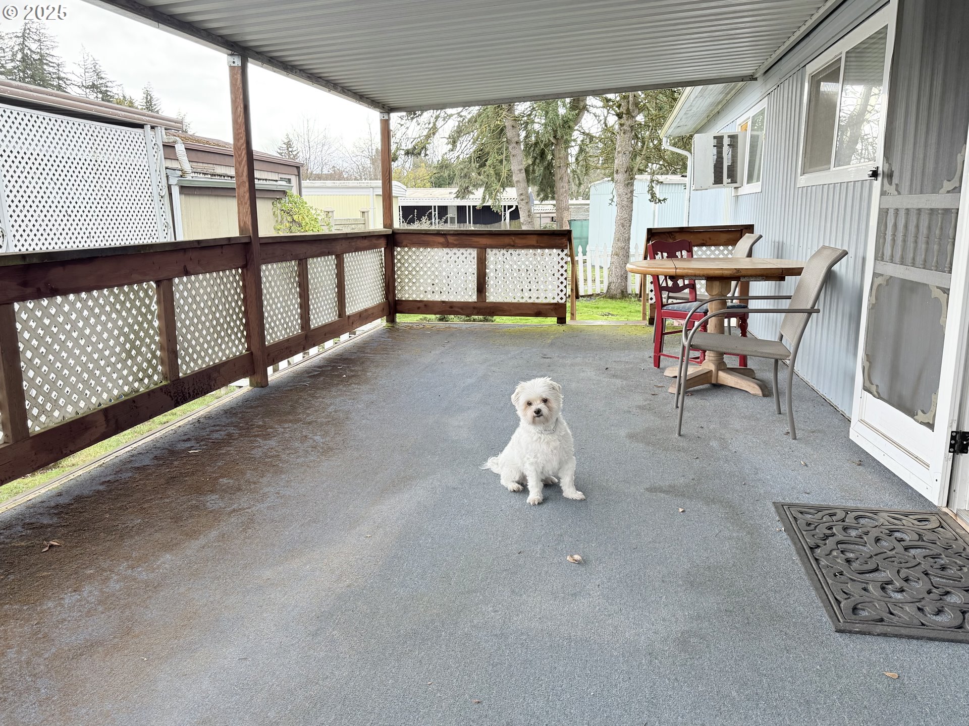 1475 Green Acres Road, Unit 40 Eugene, OR 97408 - Photo 24 of 30 a living room with furniture and a large window
