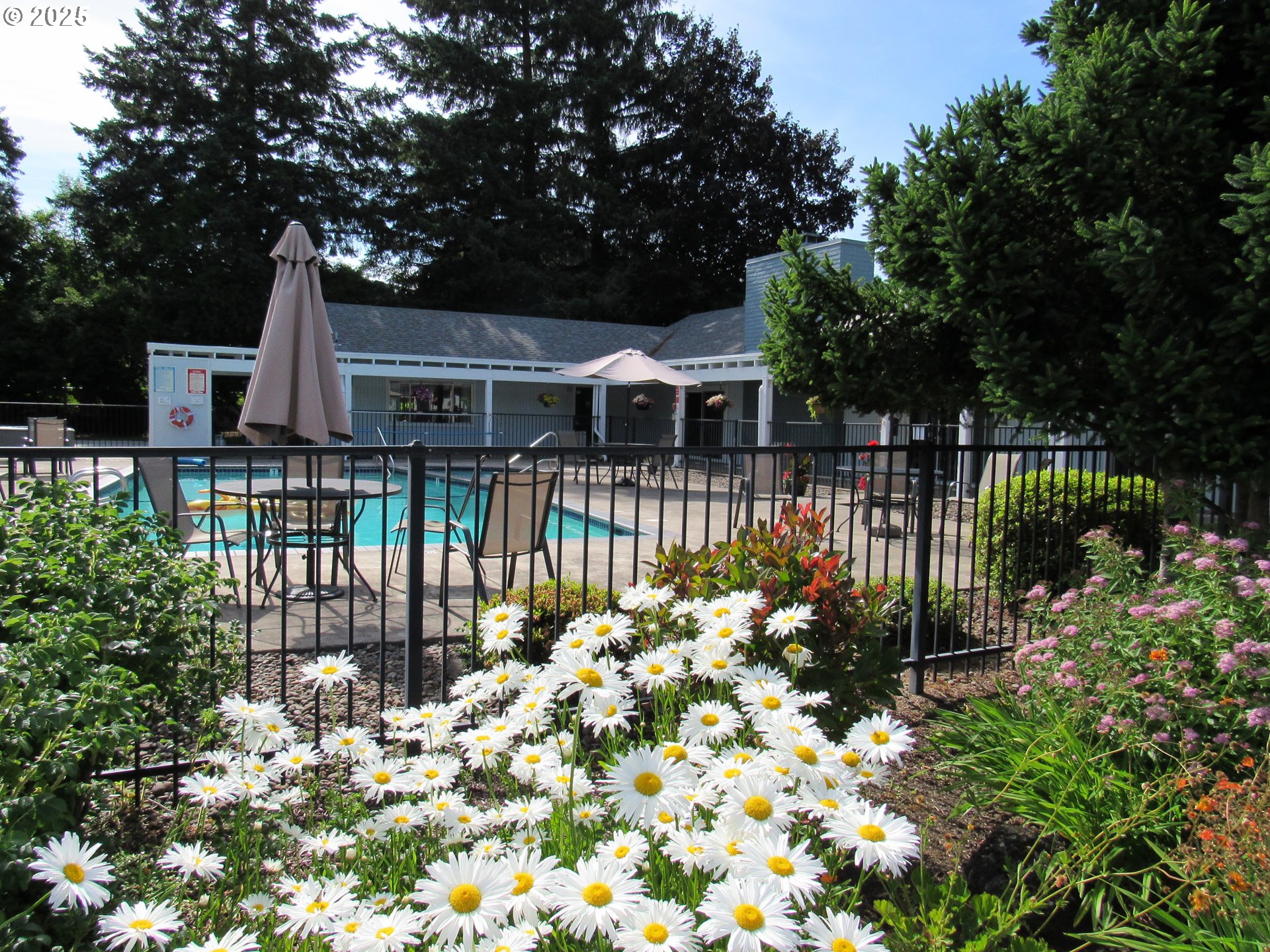 1475 Green Acres Road, Unit 40 Eugene, OR 97408 - Photo 27 of 30 a view of a house with wooden fence