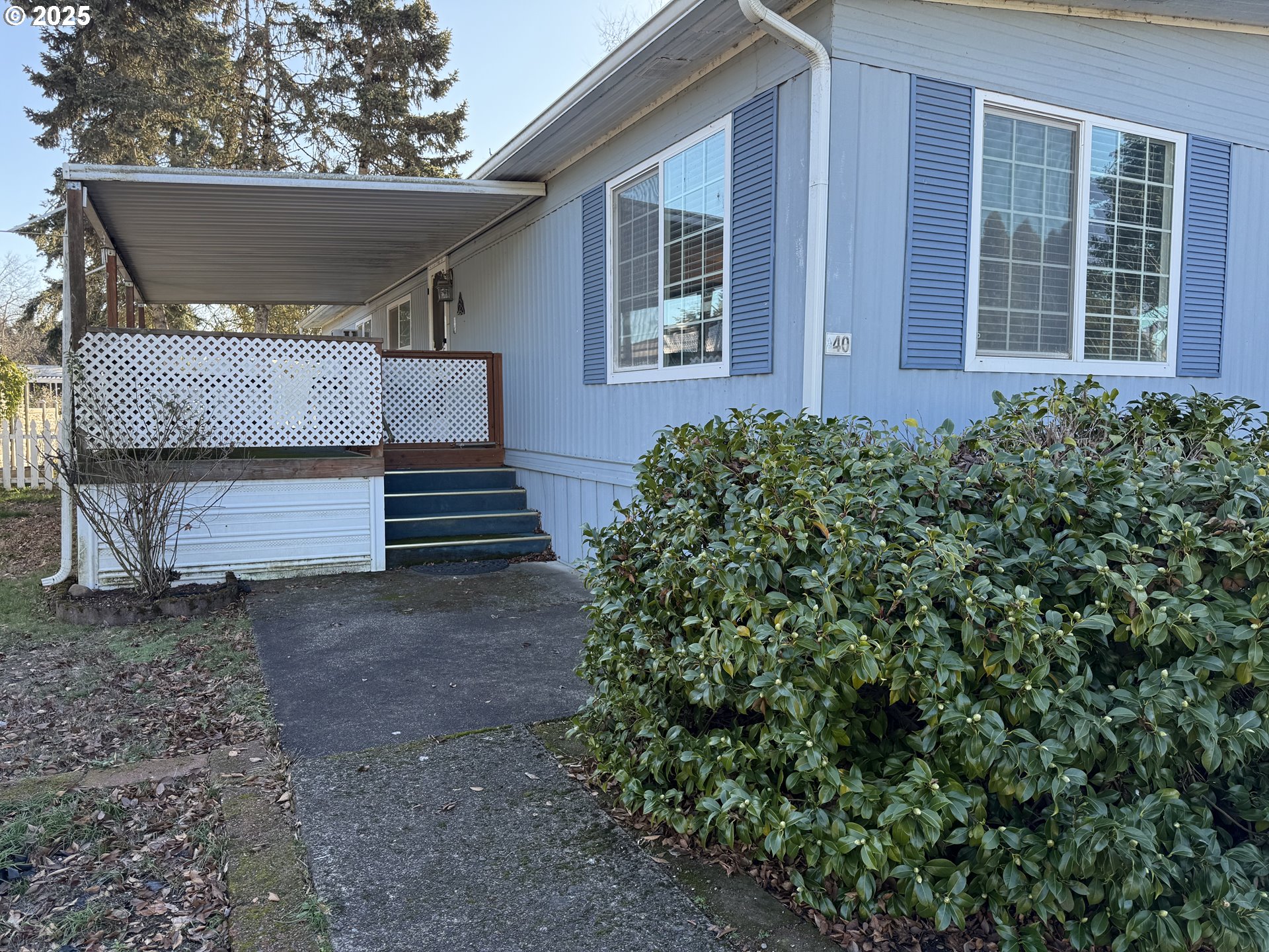 1475 Green Acres Road, Unit 40 Eugene, OR 97408 - Photo 4 of 30 a view of a house with a yard