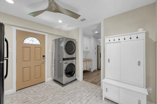 a bathroom with a bathtub and shower