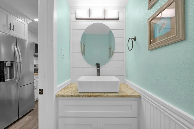 a view of a hallway with washer and dryer