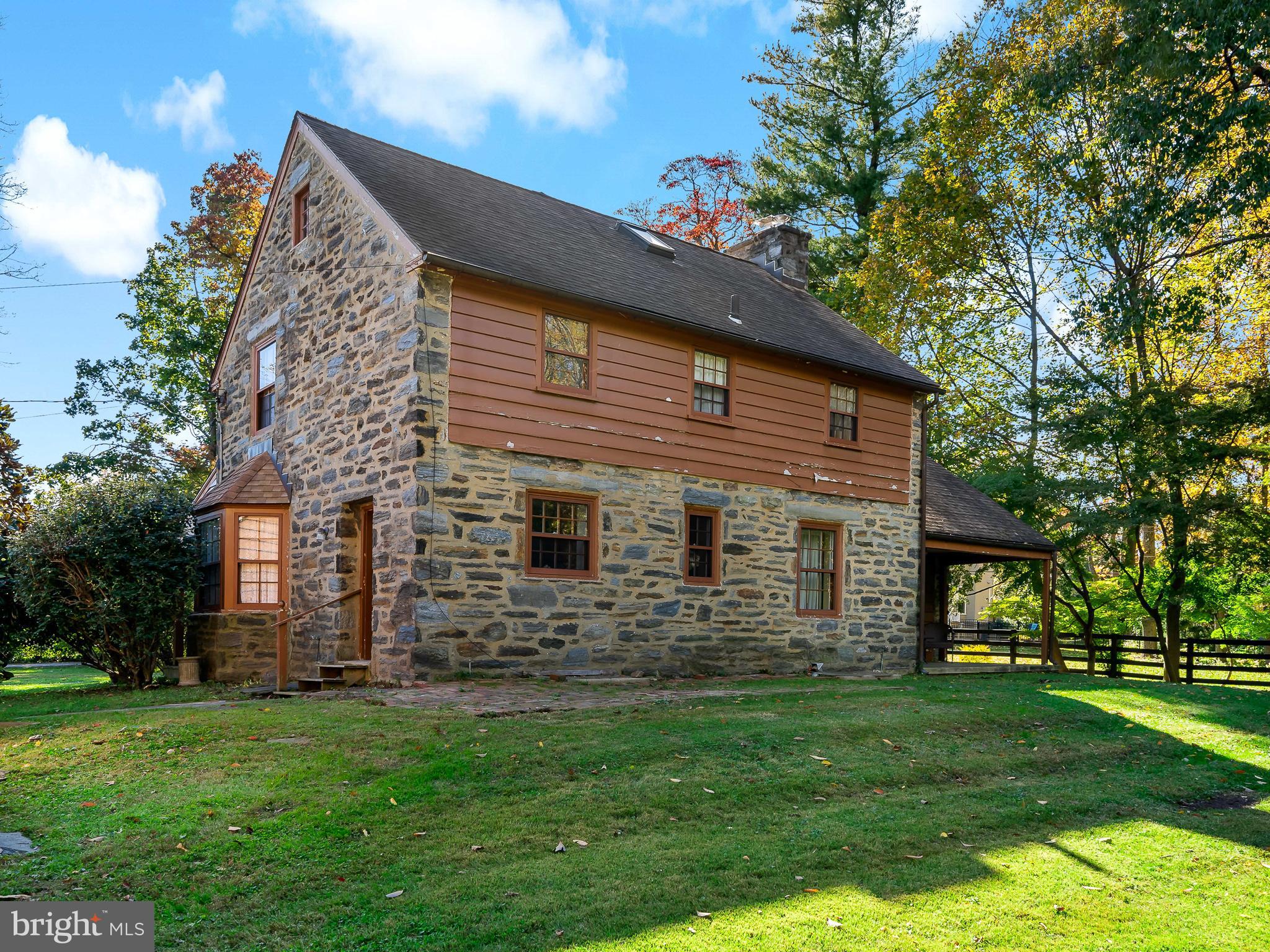 428 Righters Mill Road Gladwyne, PA 19035 - Photo 7 of 9 a view of a house with a backyard