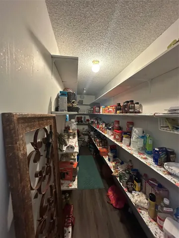 a bed room with bed and window