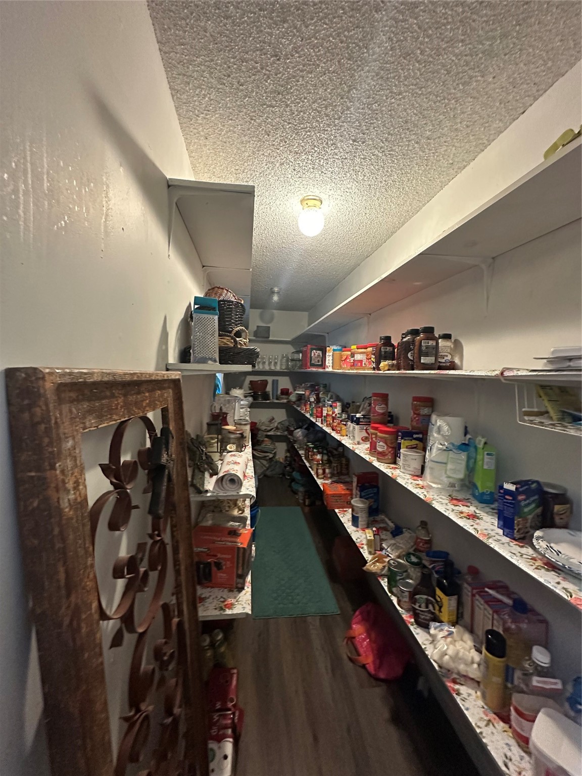 510 Ray Street Buffalo, TX 75831 - Photo 20 of 43 a kitchen with lots of bottles of alcohol