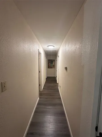 a bedroom with furniture and a chandelier