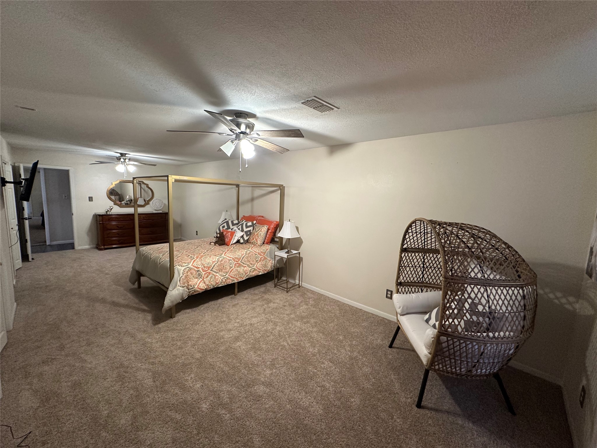 510 Ray Street Buffalo, TX 75831 - Photo 27 of 43 a bedroom with furniture and a chandelier
