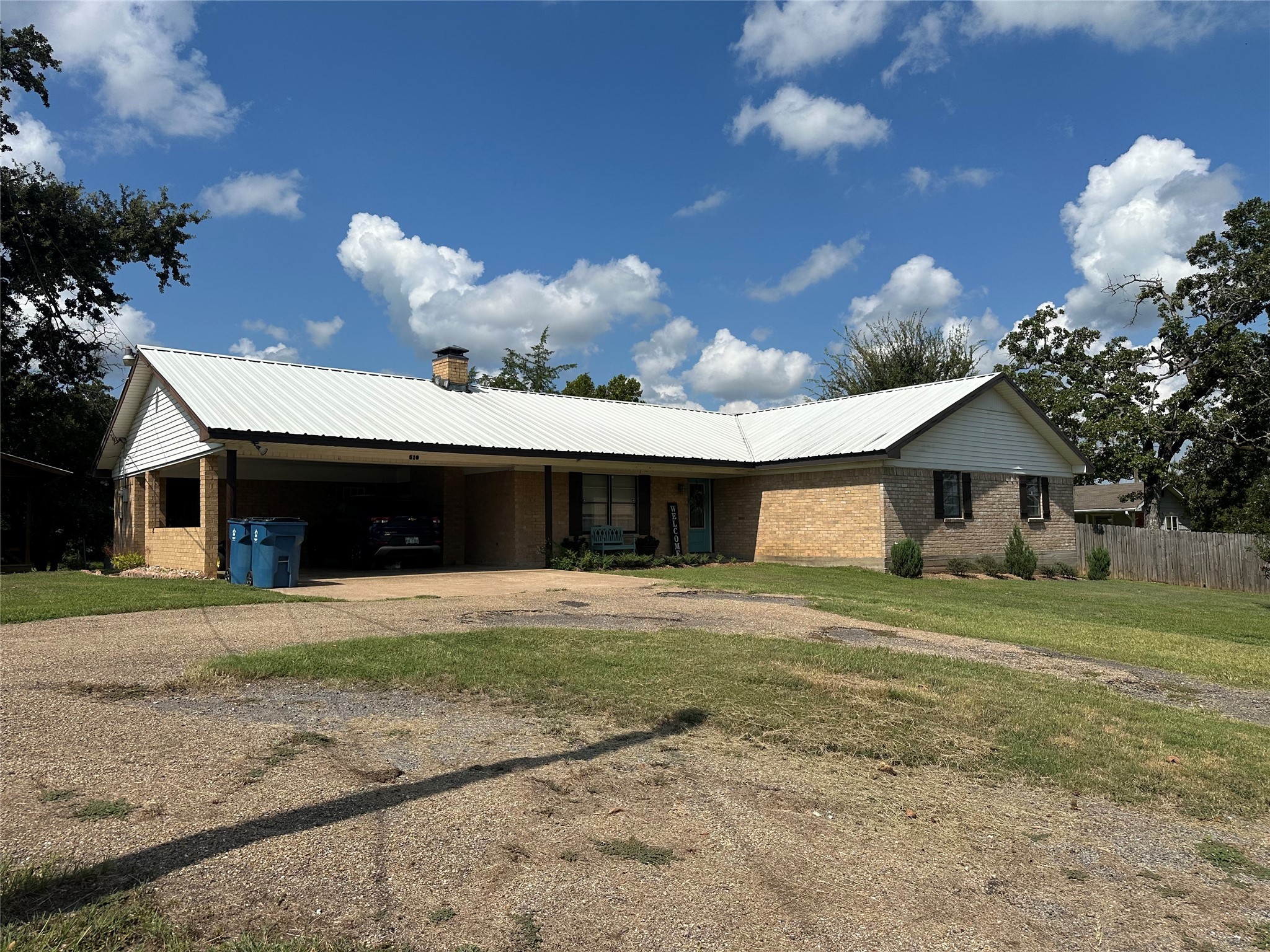 510 Ray Street Buffalo, TX 75831 - Photo 3 of 43 a front view of a house with a yard and garage