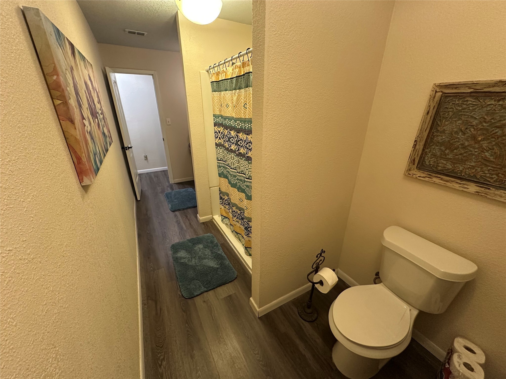 510 Ray Street Buffalo, TX 75831 - Photo 33 of 43 a bathroom with a toilet and a mirror