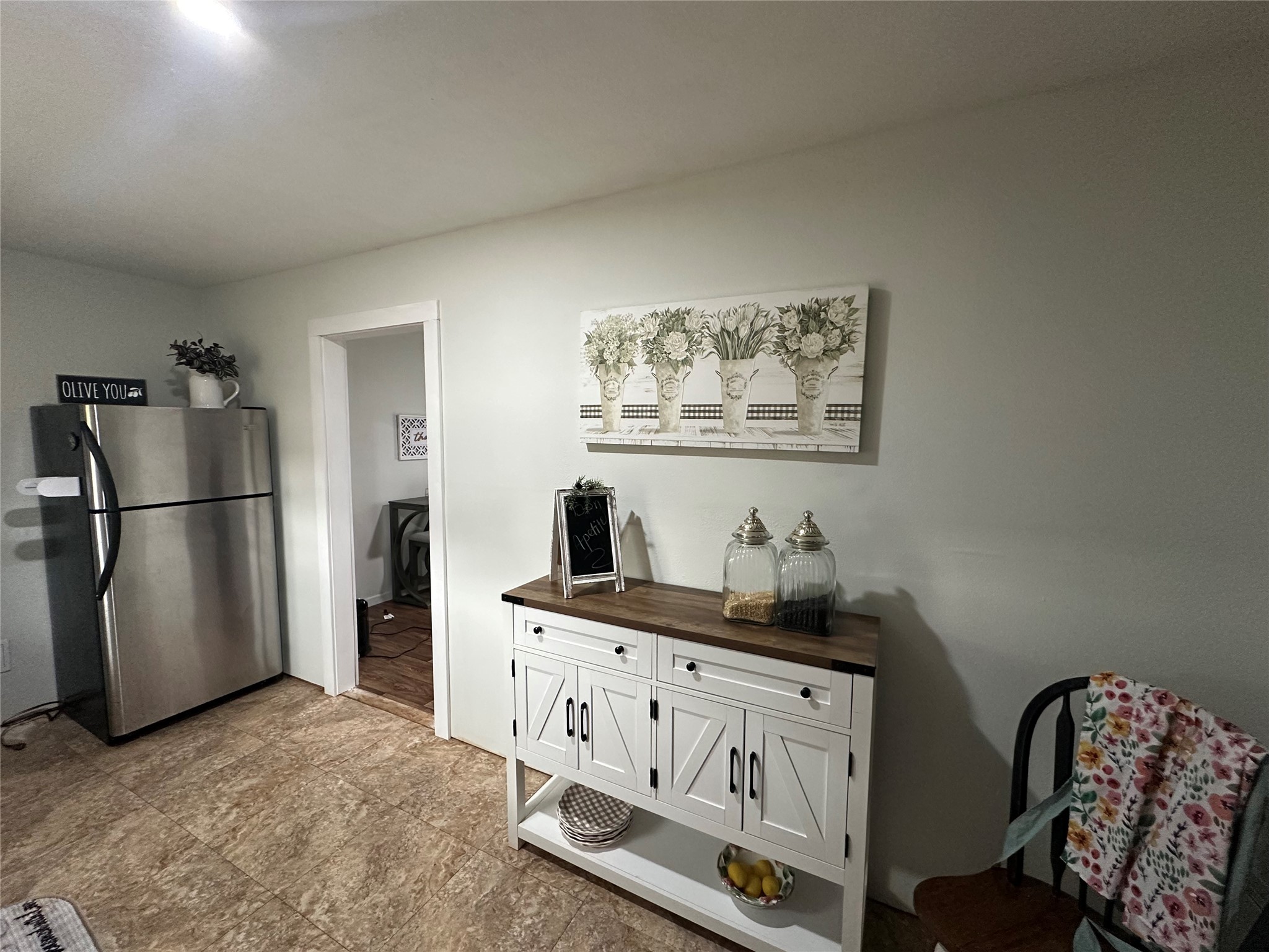 510 Ray Street Buffalo, TX 75831 - Photo 42 of 43 a kitchen with stainless steel appliances granite countertop a refrigerator a stove a sink and white cabinets