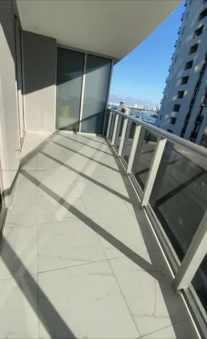 a view of a balcony with an outdoor space