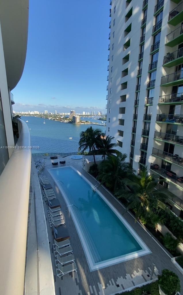 488 Northeast 18th Street, Unit 1804 Miami, FL 33132 - Photo 19 of 42 a view of a balcony with chairs