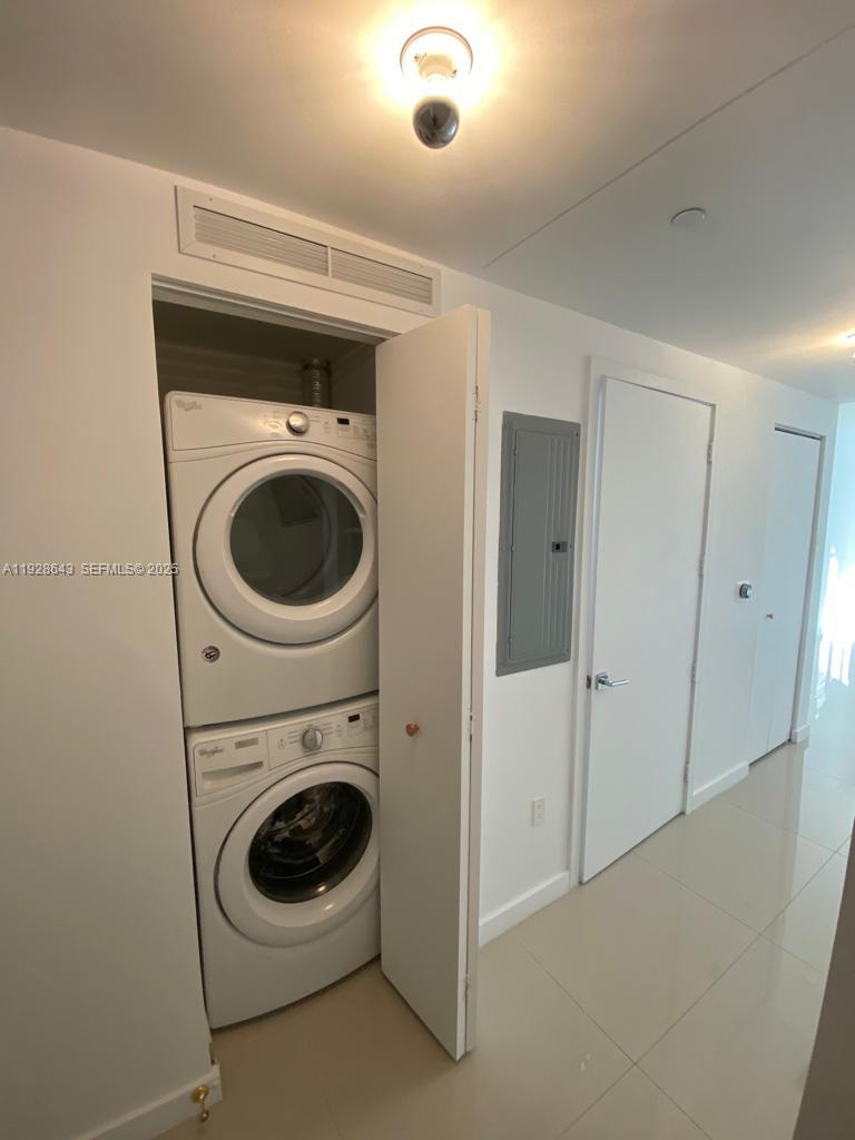 488 Northeast 18th Street, Unit 1804 Miami, FL 33132 - Photo 21 of 42 a utility room with dryer and washer